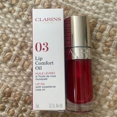 Clarins Lip Oil Cherry, Red Stuff Aesthetic, Red Makeup Products, Red Lip Oil, Red Skincare, Cherry Lip Gloss, Clarins Lip Oil, Cherry Products, Clarins Makeup