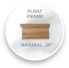 a white plate with a wooden frame on the front and back of it that says float frame natural 25 '