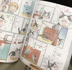 an open children's book with pictures of cats and kittens in the pages