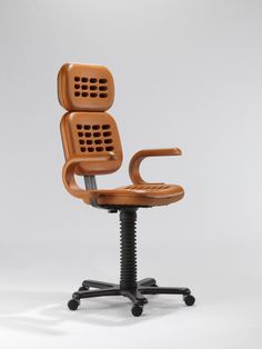 an office chair made out of wood and metal, with the seat up to one side