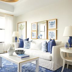 a living room with blue and white decor