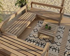 wooden chairs and tables on the beach with palm trees in the background