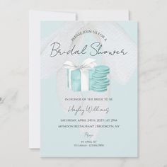 a blue and white bridal shower party card