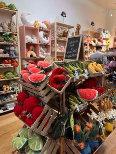 a display in a store filled with lots of stuffed animals