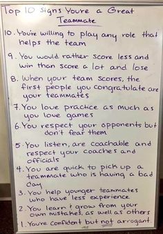 a white board with writing on it that says top 10 signs you're a great team mate