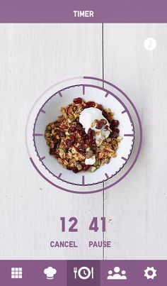 a white plate topped with granola and yogurt