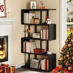 a living room with a christmas tree, fireplace and bookshelf in the corner