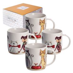 three coffee mugs with cats on them in front of a gift box and an envelope