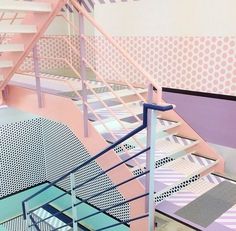 the stairs are painted in different shades of pink, blue and white with polka dots on them