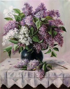 a painting of lilacs in a black vase on a table with white doily