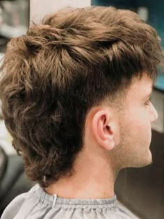 27 Stylish Mullet Hairstyle Ideas for Men in 2024 - WiseBarber.com Texture Mullet Men, Neat Mullet Men, Mens Hairstyles Shaggy, Strait Hair Mullet Men, Men’s Hair Mullet, Mullet Fade Men Straight Hair, Low Taper Mullet Straight Hair, Australian Mullet Men, Types Of Mullets Men