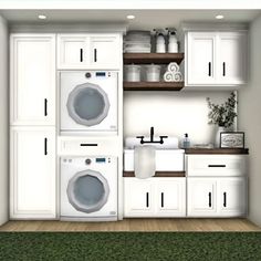 this is an image of a small laundry room with washer and dryer in it