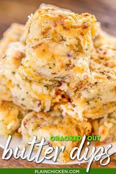 a stack of baked butter dips on top of a white plate with text overlay