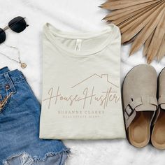 "Hustle with heart in our Bella + Canvas House Hustler Personalized Real Estate Shirt! ✨ Calling all go-getting real estate agents! Show off your dedication and fierce drive with this stylish and personalized realtor tshirt. Featuring the bold statement \"House Hustler\" in charming cursive underneath a minimalist roof illustration, it instantly conveys your passion and commitment to helping clients find their dream homes. But the best part? It gets personalized with your name, making it uniquely yours and instantly recognizable. Here's why this Bella Canvas realtor shirt is your new realtor essential: - Bold & Personalized: The eye-catching design paired with your name exudes confidence and professionalism, showcasing your expertise and hustle to potential clients. - Premium Comfort: Made Realtor Life Shirt, Realtor Tshirt, Roof Illustration, Realtor Shirts, Real Estate Shirts, Tshirt Custom, Plaid Dog Bandana, Real Estate Humor, Confidence Boosters