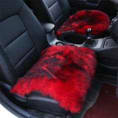 the interior of a car is decorated with red fur