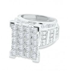 a white gold ring set with square and round cut diamonds on the sides, surrounded by small pave stones