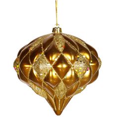 a golden ornament hanging from a gold chain on a white background with clippings