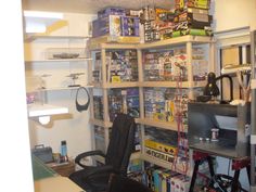 a room with shelves full of various items and equipment, including a computer chair in the corner