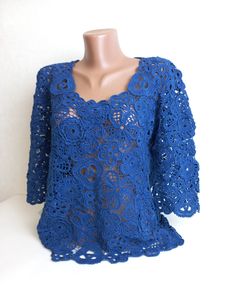 Introducing a masterpiece of craftsmanship and elegance: the handmade crocheted blouse, crafted with meticulous care and utilizing the exquisite Irish lace technique.  This sweater is not just a garment; it's a testament to the artistry and tradition of crochet, combining intricate patterns with modern sensibility. Size: XL breast 96-100cm/37,7'-39'inches waist 92-96cm/36'-37,7'inches length 58cm/22,8'inches sleeve 3/4, 42cm/16,5'inches Material: cotton yarn Color: blue Product care: Hand washin Elegant Crochet Top For Spring, Blue Crochet Lace Top, Blue Lace Crochet Top, Elegant Lace Crochet Top With Open Knit, Handmade Long Sleeve Crochet Top, Elegant Spring Crochet Tops, Handmade Lace Crochet Dress, Elegant Cotton Crochet Lace Top, Elegant Cotton Crochet Top With Lace Detail