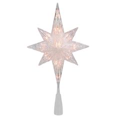 a lighted christmas star decoration on a white background