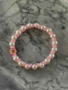 Pink pearl bracelet Cheap Pink Polymer Clay Beaded Bracelet, Cheap Pink Polymer Clay Beaded Bracelets, Pink Bracelet Ideas, Friendship Bracelets Pink, Ideas Para Hacer Pulseras, Pulseras Aesthetic, Ideas Para Pulseras, Aesthetic Bracelets, Pink Bracelets