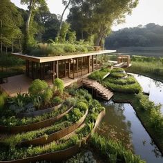 the house is surrounded by greenery and water features many steps leading up to it