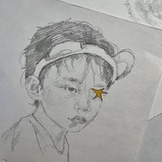 a pencil drawing of a man with a star on his forehead, and another person's head in the background