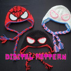 three crocheted hats with spiderman faces on them