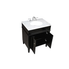 a white sink sitting underneath a black cabinet