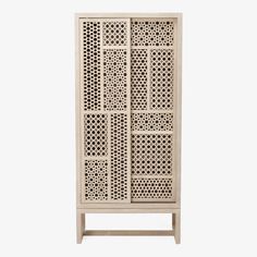 a wooden cabinet with lattice design on the front and side panels, against a white background