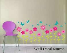 a wall decal with flowers and butterflies on it