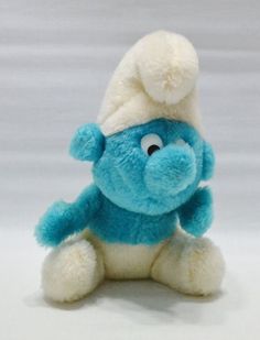 a blue and white stuffed animal wearing a hat