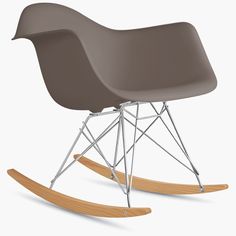 a gray rocking chair with wooden legs on an isolated white background for use in interior and exterior design