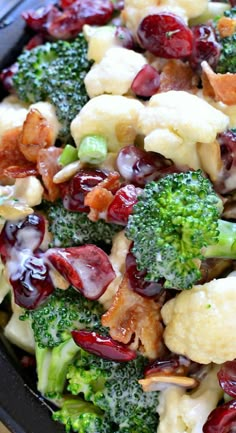 broccoli, cauliflower, cranberries and other foods are mixed together