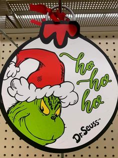 there is a sign that says ho hoo with an image of the grin face on it