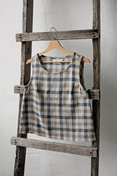 Plaid sleeveless shirt is made from 100% soft and washed linen. Details: - Colour: Beach - Composition: 100% Oeko-Tex certified linen - A line style - Medium weight linen - Linen care: machine wash gentle; tumble dry low, ironing optional - The price is for one shirt, other pictured items are not included Linen Tops, Shirt Linen, Plaid Top, How To Make Clothes, Linen Blouse, Plaid Tops, Style Shirt, Linen Top, Womens Tunics