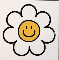 a flower with a smiley face drawn on it