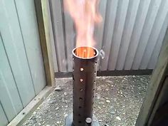 a large metal object with flames coming out of it