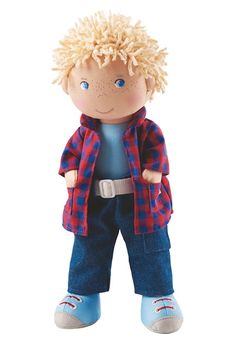 a small doll with blonde hair and blue jeans is wearing a red checkered shirt