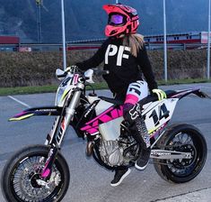 a person on a dirt bike wearing a helmet