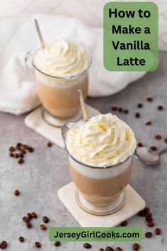 two glasses filled with vanilla latte and topped with whipped cream