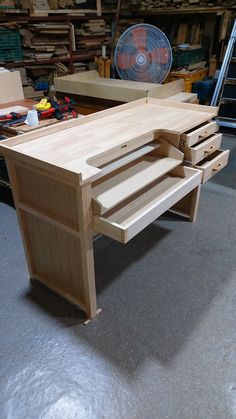 a workbench made out of plywood in a workshop