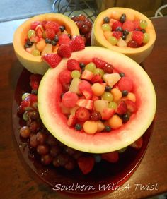 some fruit is cut in half and placed on top of each other to look like watermelon