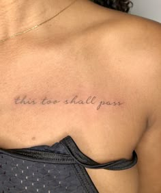 a woman's chest with the words, this to shall pass written on it