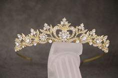 "Gold Rhinestone Wedding Tiara, Royal Bridal Crown, Gold Princess Crown, Princess Tiara, Gold Bridal Tiara, Gold Tiara, Gold Crown This elegant and sparkly Rhinestone Tiaras is perfect for your wedding or formal night out. This tiara is flexible. It will be perfect for the bride.  The Metal Headband measured approx. 13.5\" long. The rhinestone part of the headband is about 7.25\" long and the center is 1.5\" high. Tone color: Silver tone , Gold tone and Rose gold tone  To see more headbands or T Gold Tiara Quinceanera, Wedding Tiara Gold, Quince Tiaras Gold, Quince Crowns Gold, Wedding Hair Tiara, Gold Bridal Tiara, Golden Tiara, Tiara Royal, Princess Tiaras