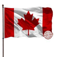 the canadian flag is flying in the wind with a stamp on it's side