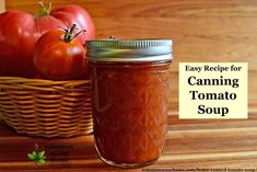 an easy recipe for canning tomato soup in a mason jar on a table with tomatoes