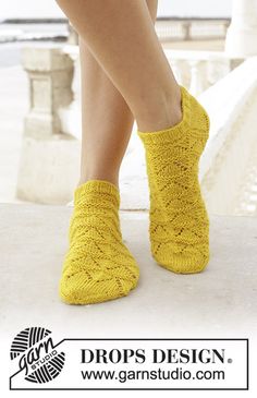 the legs of a woman wearing yellow socks