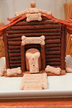 a gingerbread house made to look like a doghouse