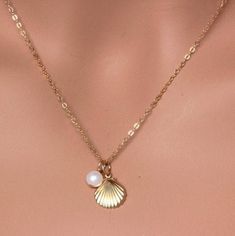 "Tiny 14k Gold Fill Starfish with pearl Necklace It could be Sterling silver as well. This necklace use for Everyday and cute. It make of ... -14k Gold Fill starfish and -4-6mm freshwater pearl, -14k gold fill cable chain with spring claw. -it come with small ribbon jewelry box and -One set of Care instruction package. -It could be 925 Sterling Silver as well. Total length will be 16\" or 18\"or 20\" MORE SEA CHARM NECKLACE https://www.etsy.com/shop/rainbowearring1/search?search_query=sea+charm& Pearl Charm Strand Jewelry As Gift, Pearl Charm Strand Jewelry Gift, Elegant Starfish Charm Jewelry As Gift, Elegant Starfish Charm Jewelry For Gifts, Elegant Gold Strand Jewelry, Elegant Starfish Charm Jewelry Gift, Elegant Pearl Strand Jewelry, Elegant Strand Necklace, Gold Strand Charm Necklace As Gift